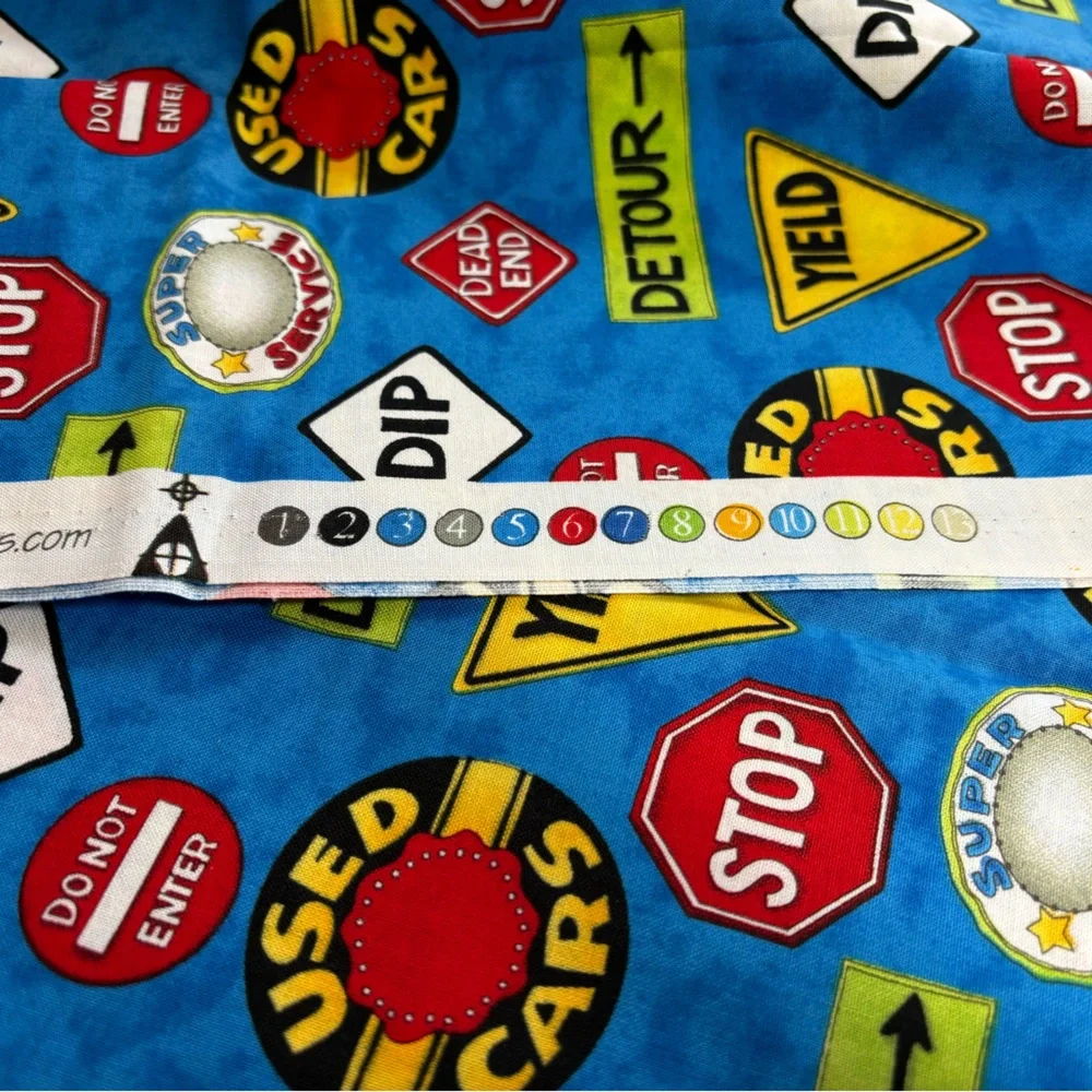 SSI Little Hot Rod Blue Traffic Sign Patterned Fabric - 1 Yard Cut. Cotton